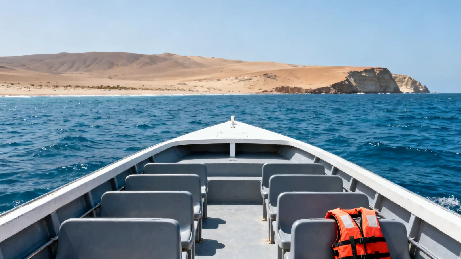 An open passenger boat used as a photographic illustration